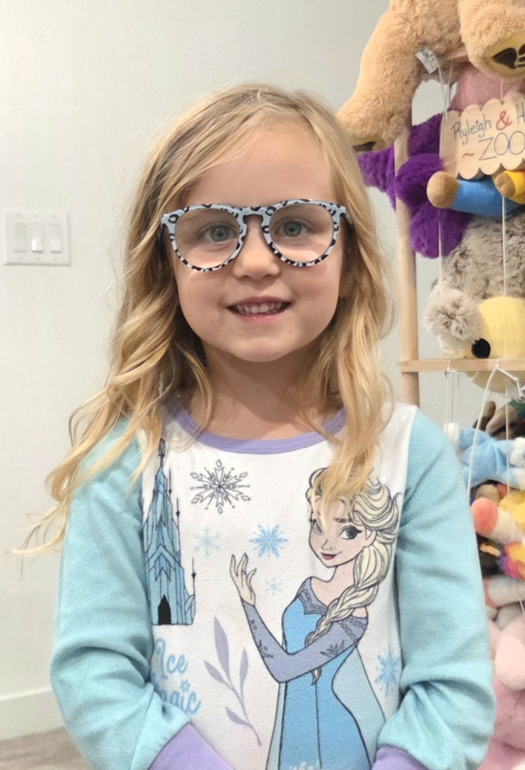 Athlete with blonde hair and patterned glasses